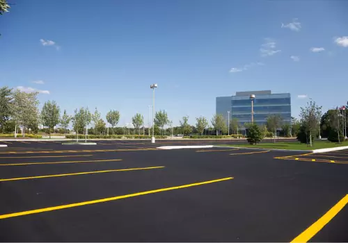 A freshly paved and stripped parking lot, thanks to commercial paving contractors in Illinois