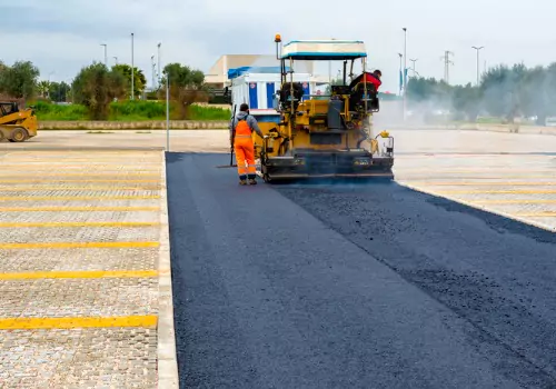 Asphalt machinery at work on a job for Asphalt Paving in Bloomington IL